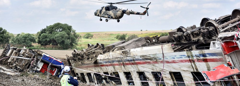 A helicopter flies over the site where a train derailed at Corlu district in Tekirdag, northwest Turkey, on July 9. (Photo: AFP)