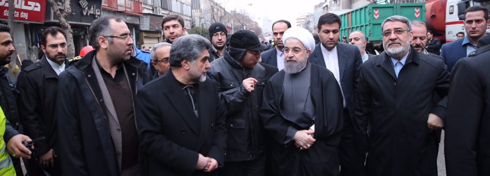 Rouhani Visits Site of Collapsed High-Rise  