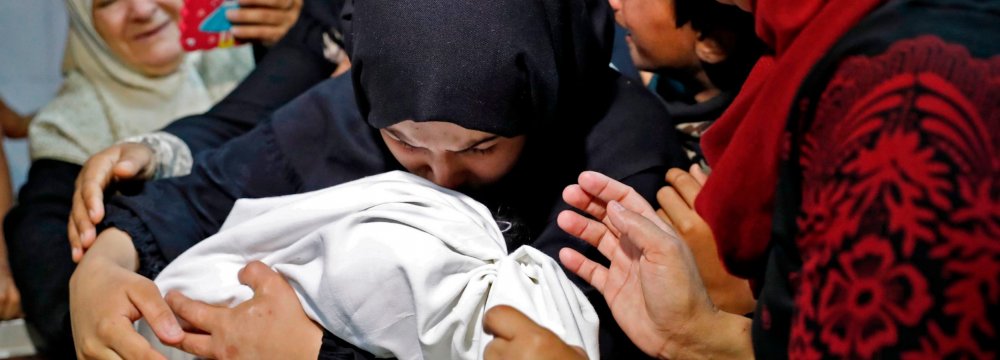 Hundreds marched in the funeral of  eight-month-old Leila al-Ghandour,  who died of inhaling tear gas.