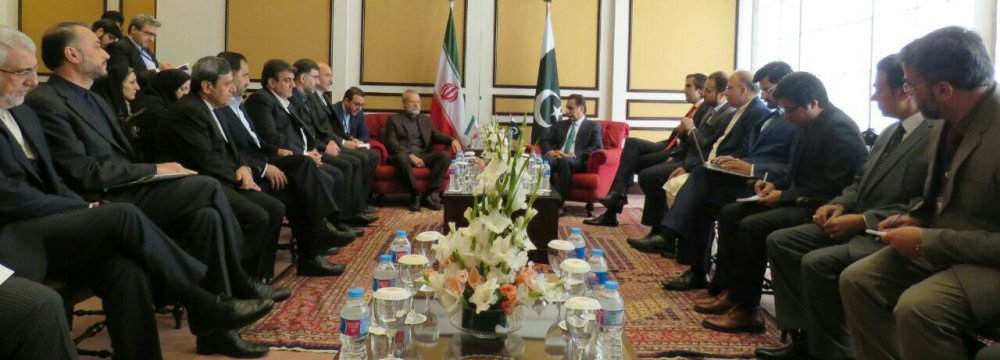 High-level Iranian and Pakistani officials confer on Dec. 25 in Islamabad.