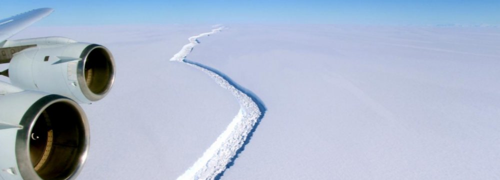  A rift across the Larsen C Ice Shelf that had grown longer and deeper is seen during an airborne survey of changes in polar ice over the Antarctic Peninsula.