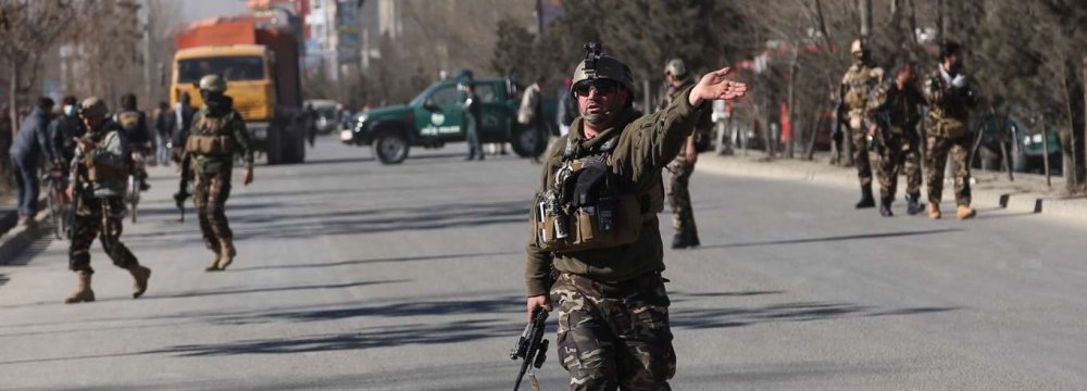 Afghan forces secure the region around the Intercontinental Hotel in Kabul, Afghanistan, January 21.         