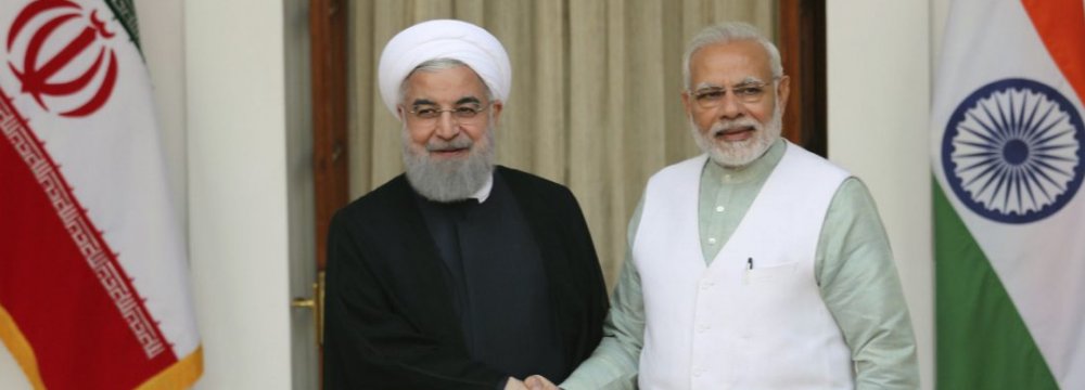 Indian Prime Minister Narendra Modi (R) shakes hand with Iranian President Hassan Rouhani before their delegation-level meeting in New Delhi, India, on Feb. 17, 2018. (File Photo)