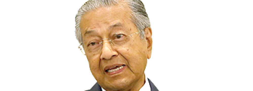 Mahathir: Muslims Should Unite After Iran Commander’s Assassination 
