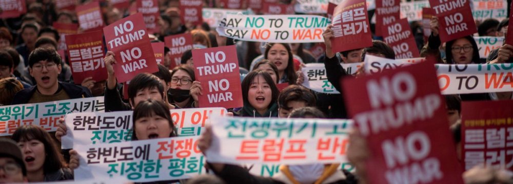 Thousands demand peace in anti-Trump protest in South Korea, Nov. 7.
