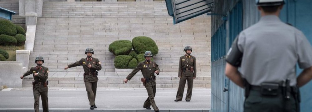 N. Korea Agrees to Talks as US, South Postpone Drills