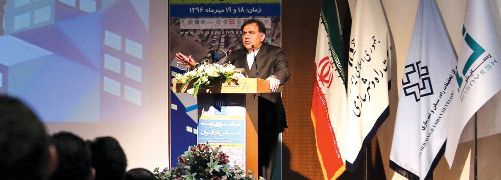 Roads Minister Abbas Akhoundi addresses the 17th Conference on Housing Development Policies in Tehran on Oct. 10. (Photo: Foroogh Alaei Roozbahani)