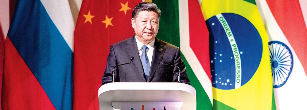 China’s President Xi Jinping addresses delegates at a Business Forum organized during the 10th BRICS summit on July 25 at the Sandton Convention Centre in Johannesburg, South Africa.