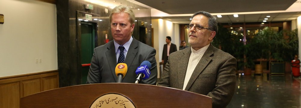 Todd McClay (L) and Governor of the Central Bank of Iran Valiollah Seif