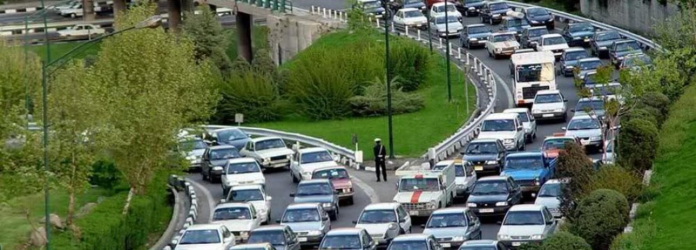 Nearly four million cars ply the streets of Tehran in a traffic system that can handle only two million.