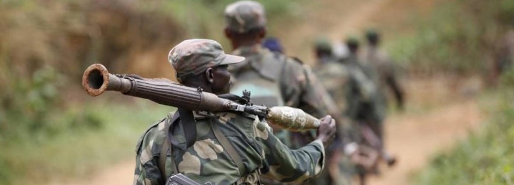 DR Congo military personnel patrol near Beni  in North Kivu Province.