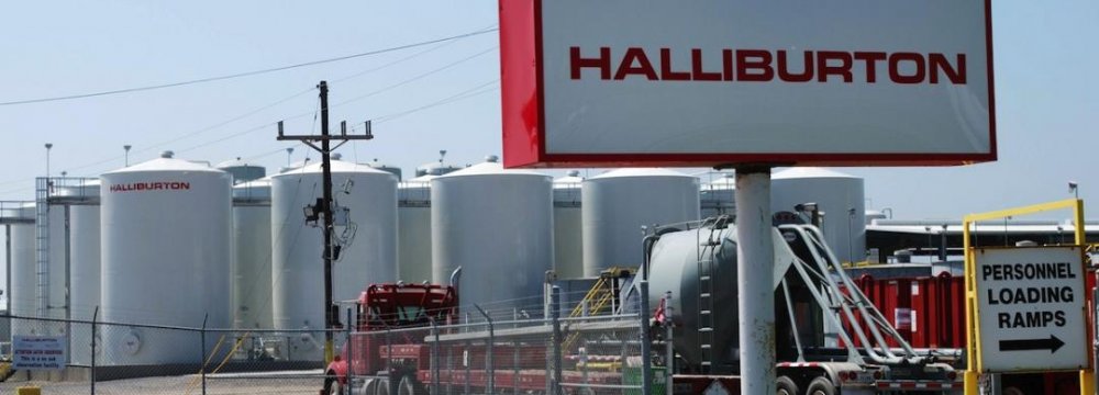 Halliburton Reports $2.1b Charge on Job Cuts, Assets