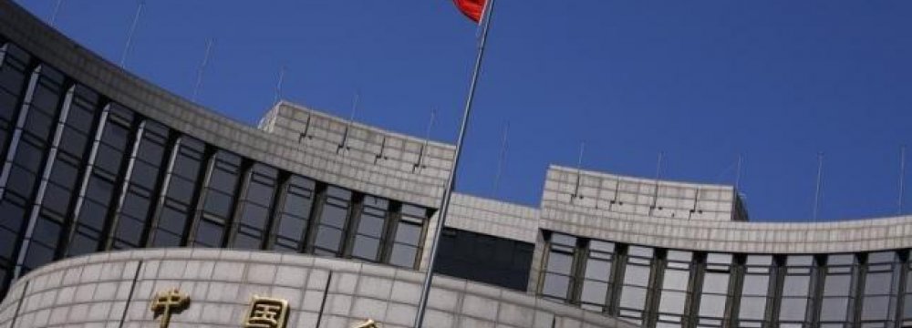 China Cuts Banks’ Reserve Ratio to Spur Growth