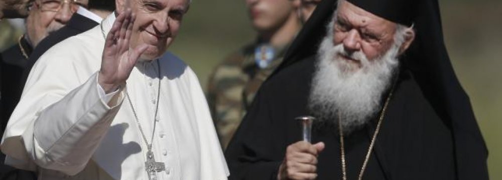 Pope Returns Home With 12 Refugees in Lesbos