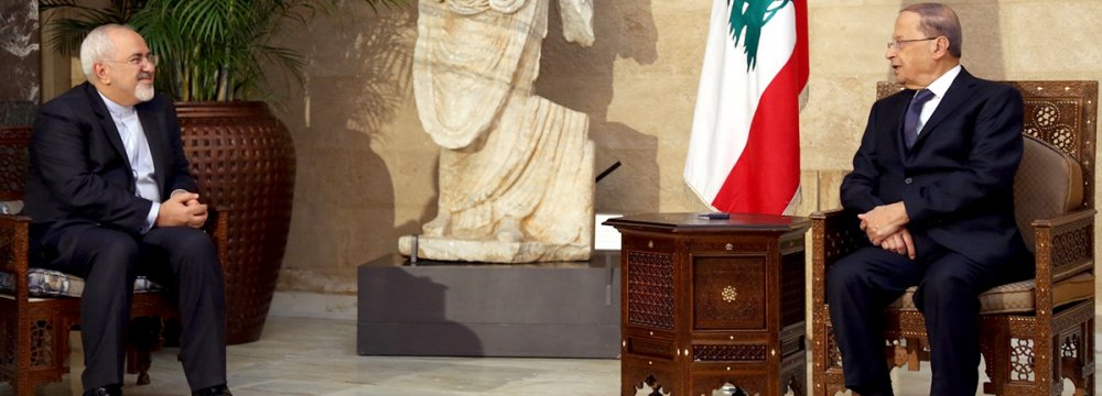 Foreign Minister Mohammad Javad Zarif (L) meets Lebanese President Michel Aoun in Beirut, Lebanon, on Nov. 7.