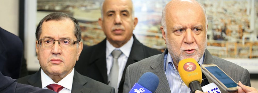 Algerian Energy Minister Noureddine Boutarfa (L) and Iranian Oil Minister Bijan Namdar Zanganeh in Tehran on Nov. 26.
