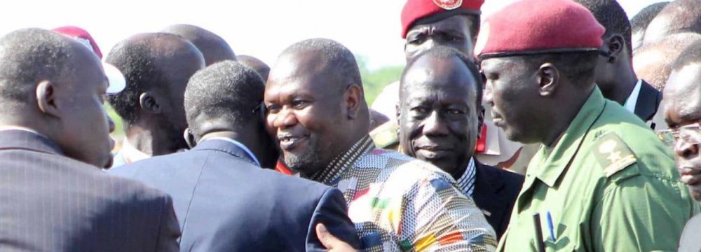 South Sudan Machar Vows to Return Home