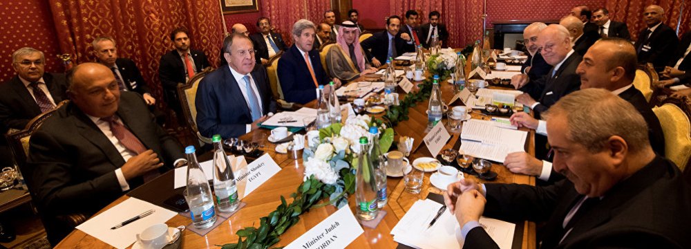 (From L-R): Egypt’s FM Sameh Shoukry, Russia’s FM Sergey Lavrov, US Secretary of State John Kerry, Saudi Arabia’s FM Adel al-Jubeir, Qatar’s FM Sheikh Mohammed bin Abdulrahman al-Thani, Iraq’s FM Ibrahim al-Jaafari, Iran’s FM Mohammad Javad Zarif, UN Special Envoy of the Secretary-General for Syria Staffan de Mistura, Turkey’s FM Mevlut Cavusoglu and Jordan’s FM Nasser Judeh meet in Lausanne, Switzerland, on Oct. 15.