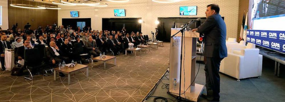  Iran’s Minister of Roads and Urban Development Abbas Akhoundi addresses the CAPA Iran Aviation Finance Summit at Tehran’s Imam Khomeini International Airport on Sept. 18. (File Photo)