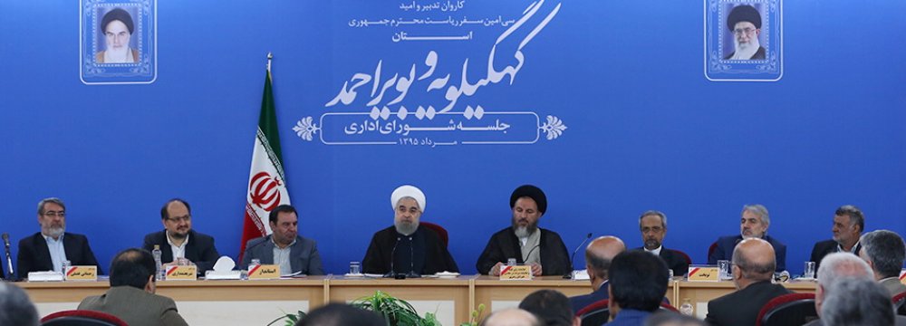 President Hassan Rouhani (4th L) addresses provincial officials in Yasouj on Aug. 15.