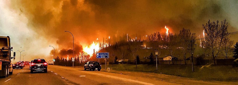 Raging Canada Fire Forces Thousands to Flee