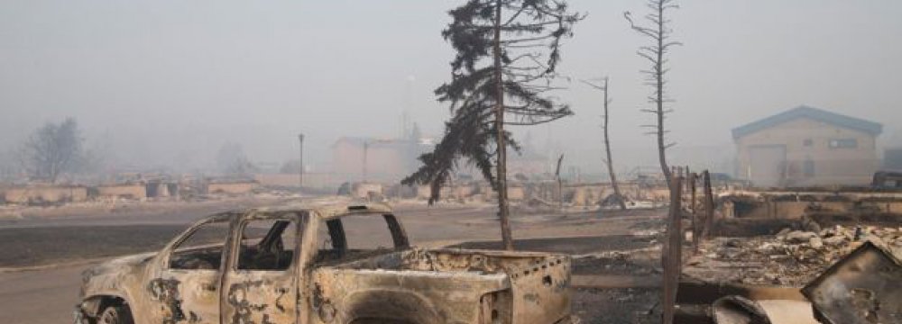 Canadian Wildfire Disrupts Evacuation 