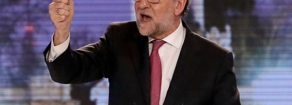 Spain Conservatives Win Vote,  But Political Landscape Fractured