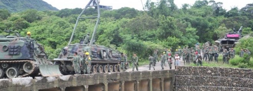 Taiwan Tank Falls Off Bridge, Kills 3 