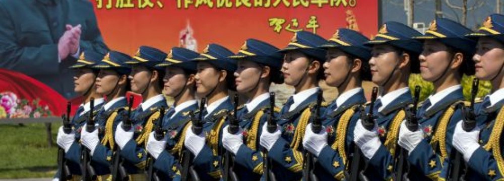 China Boosting Military Presence After Island-Building Spree