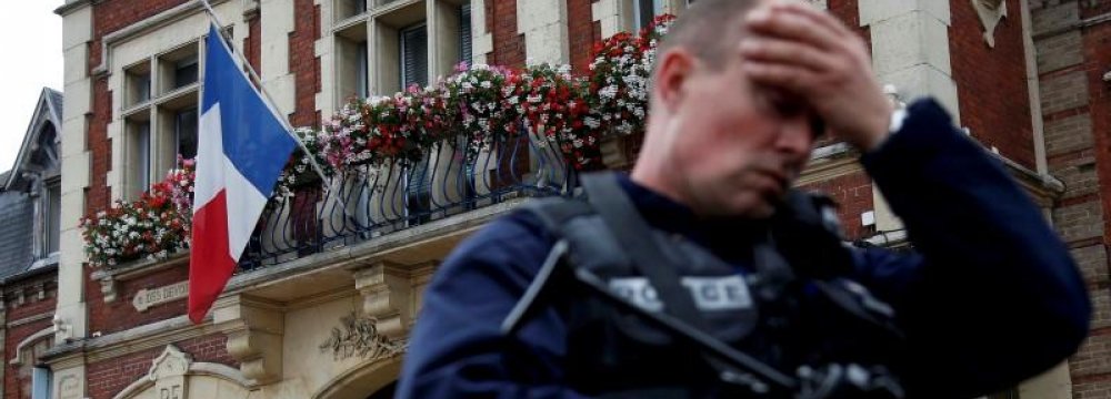 Priest Killed in French Church,  Police Shoot Two Attackers  