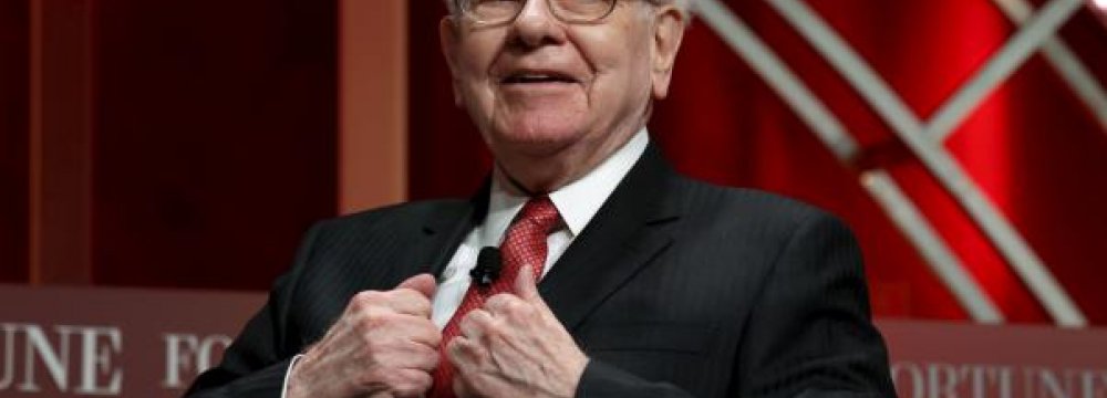 Buffett’s Co. Invests $1b in Apple Shares