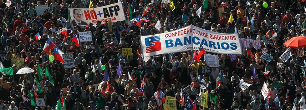 Half a million people turned out in central Santiago to complain that many retirees are being left destitute by the pension system.