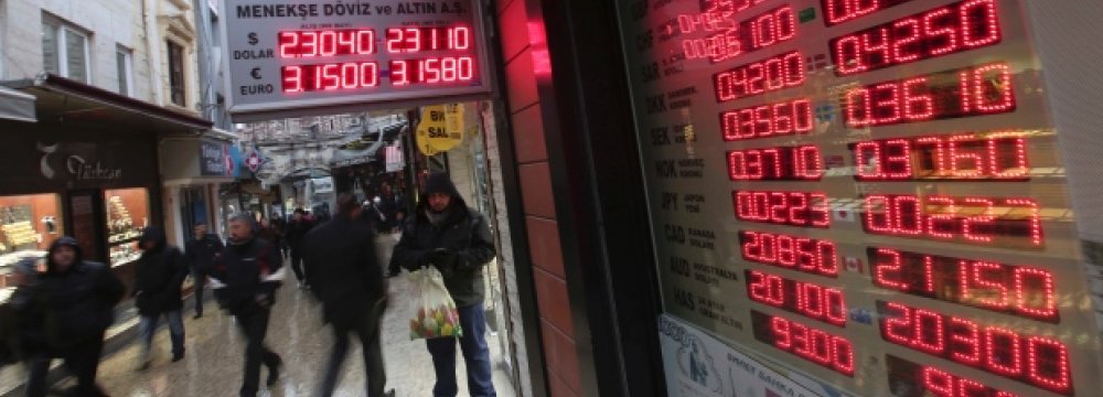 A board shows exchange rates at a foreign currency shop in central Istanbul.
