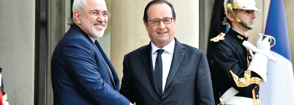 Hollande Zarif Discuss Ties, Mideast