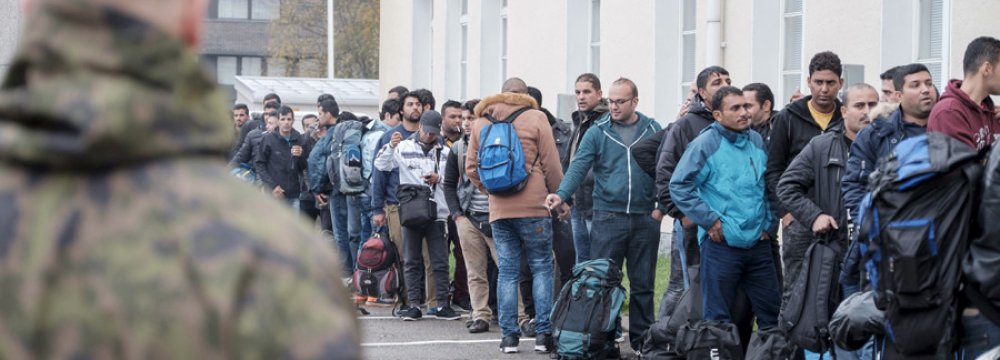 Germany, Int’l Migration Body to Track Refugees