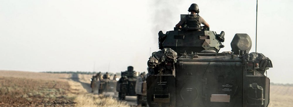 Turkish troops head to the Syrian border in Karkamis, Turkey, on Aug. 27. (File Photo)