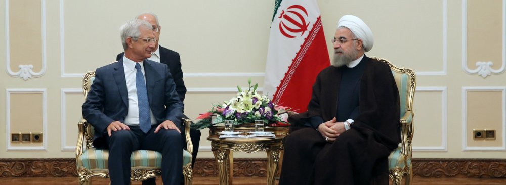 President of the French National Assembly Claude Bartolone (L) meets President Hassan Rouhani in Tehran on Sept. 6.         
