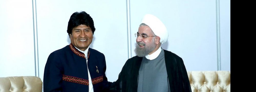 Bolivian President Evo Morales (L) shakes hands with his Iranian counterpart, Hassan Rouhani, in Venezuela on Sept. 17. 