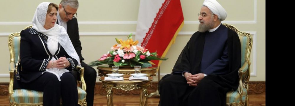 Syrian Parliament Speaker Hadiya Khalaf Abbas (L) meets President Hassan Rouhani in Tehran on Sept. 27.