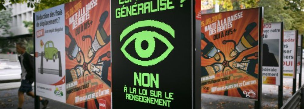 A poster that translates as “Widespread spying? No to the Law on Intelligence”  on September 16, in Geneva, Switzerland.