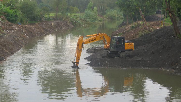 dredging a stream or a river is an example of what