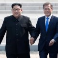 North Korean leader Kim Jong-un (L)and South Korean President Moon Jae-in meet in the truce village of Panmunjom inside the demilitarized zone separating the two Koreas on April 27. 
