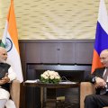 India’s Prime Minister Narendra Modi (L) and Russian President Vladimir Putin speaking during their meeting in Sochi. (Photo: AFP)