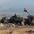 Iraqi forces advance on February 23 towards Mosul airport prior to entering the airport compound for the first time since the IS group overran the region in 2014.