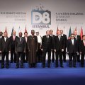 Participants pose for a family photo during the opening ceremony of D8 Organization for Economic Cooperation Summit in Istanbul on Oct. 20.