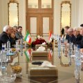 Iranian and Syrian diplomatic delegations meet in Tehran on Dec. 31.