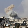 Smoke rises after shelling on a militant-held area of Deraa, Syria, on June 4.