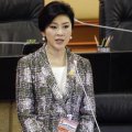 Former Thai PM Flees Ahead of Verdict
