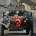 Turkey intervened militarily in northern Syria to contain both Kurdish factions and the IS. 