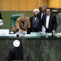President Hassan Rouhani (foreground) presented the 10.85-quadrillion-rial ($280.6 billion) budget bill early December. 